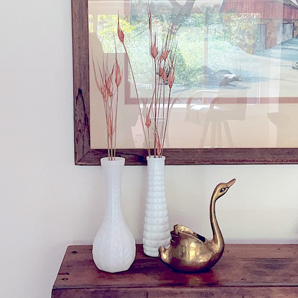A pair of milk glass vintage vases